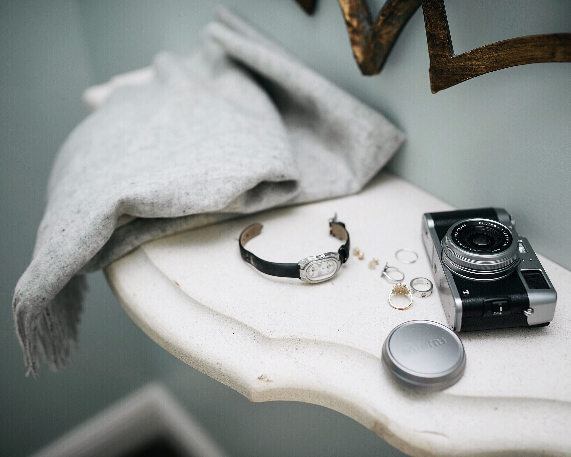 fujifilm camera, philip stein prestige cocktail, cartier love ring, cos wool scarf